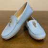 Light blue AIGNER nappa leather moccasin with a horse head detail