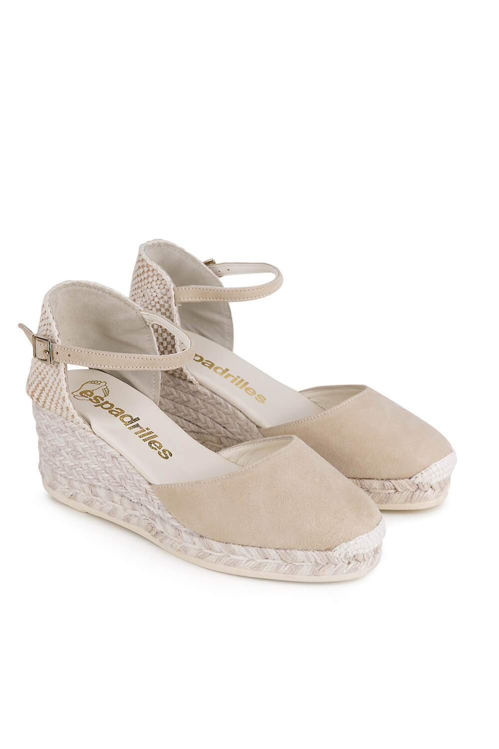 6 cm high cream colored closed suede leather toe wedge.