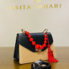 JADISE Sicilia | schwarz-rote verspielte Handtasche aus Leder und Bast KATE
