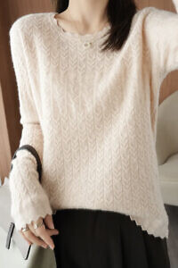 ivory 100% merino sweater with round neck and a decorative pattern