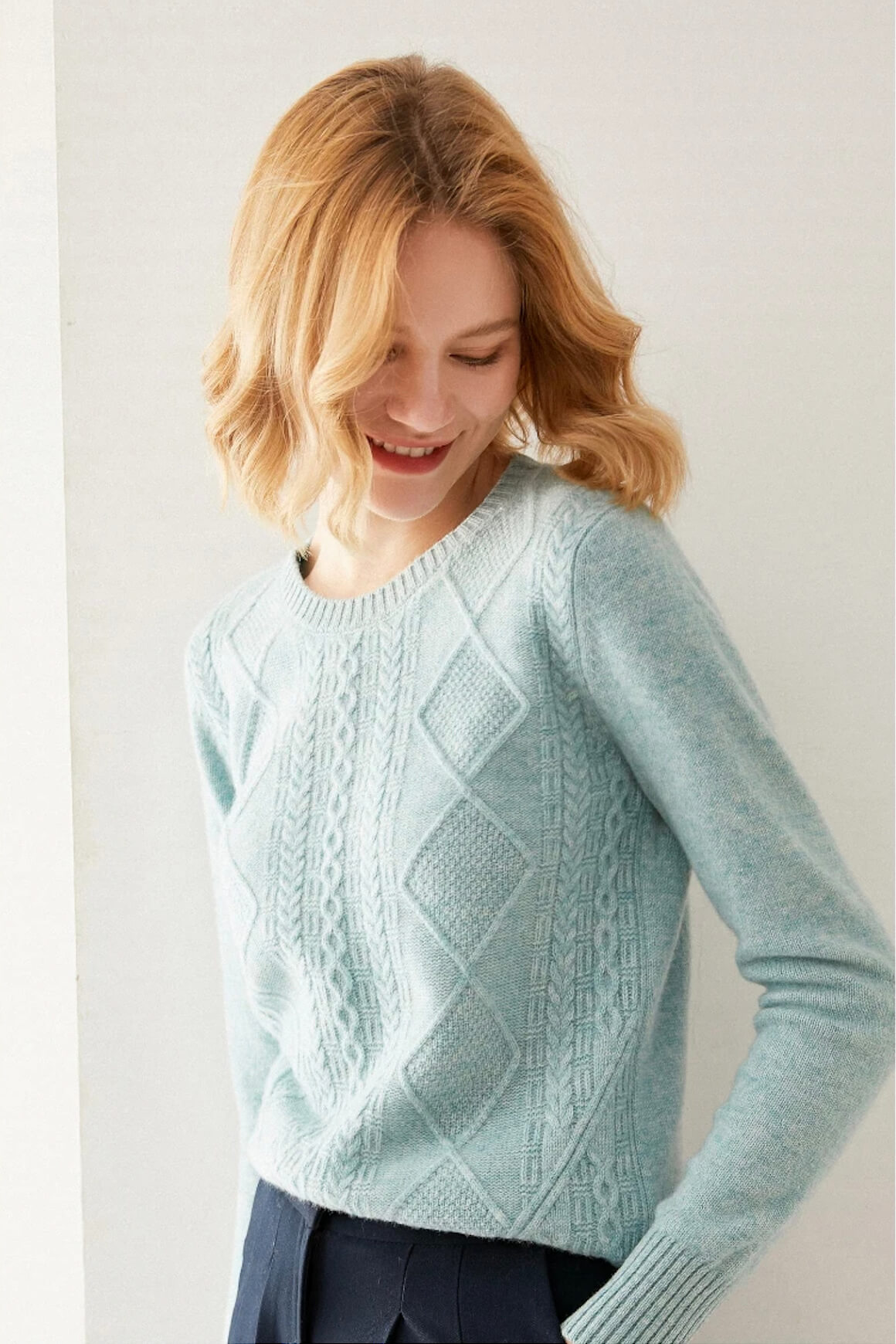 thick dusty mint 100% merino sweater with round neck and a diamond pattern